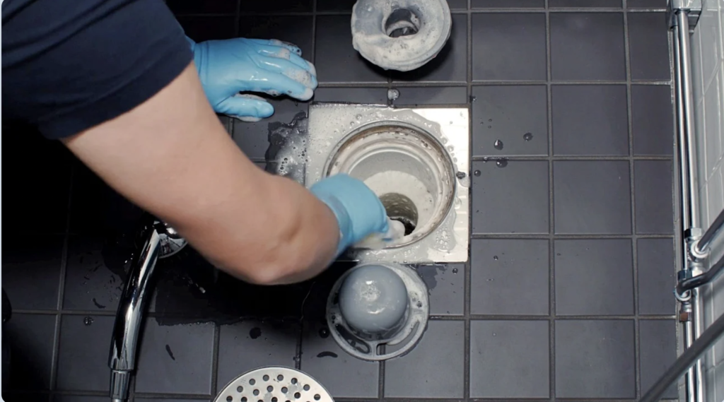 how to clean shower drain pipe