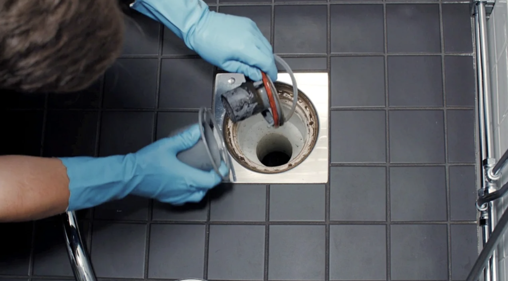 How to clean shower drain water trap