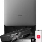 Roborock Saros 20 robot vacuum and mop beside its RockDock charging and cleaning station